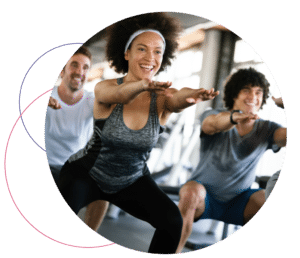 group of people stretching in gym