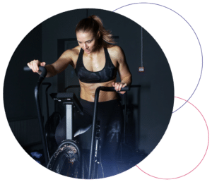woman riding bike in gym