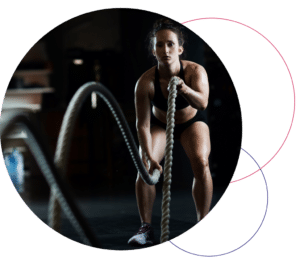 female using ropes to workout