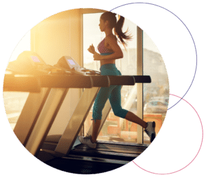 female running on a treadmill