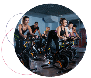 group of people taking a spin class